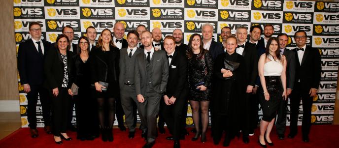 A group of people on the red carpet at the VES Awards