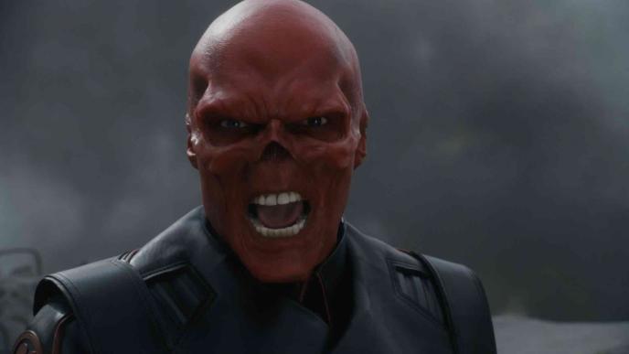 red skull character from captain america looking directly into the camera and shouting