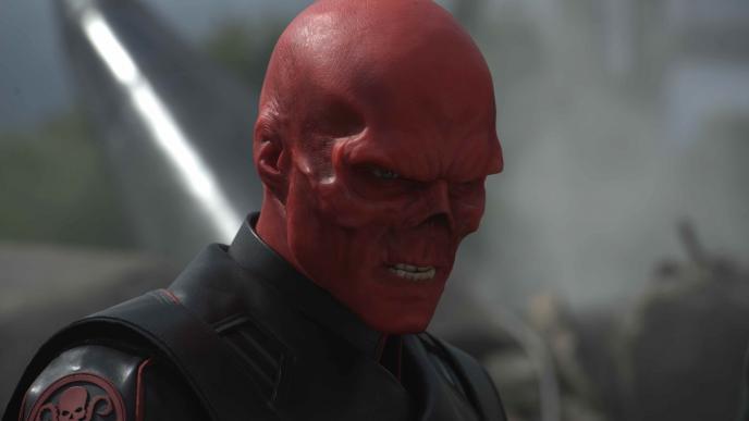 red skull character from captain america the first avenger looking angrily towards the ground