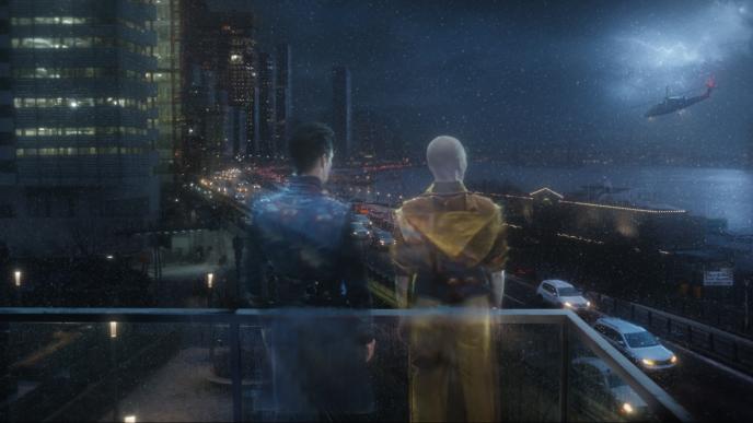 back view of doctor strange and sorcerer supreme in astral form looking onto the city in nighttime