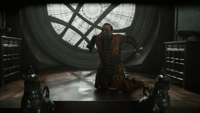 scene of character tied up in a metal contraption from doctor strange film
