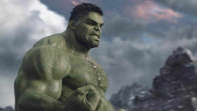 side view of hulk angrily clenching his jaw and fists