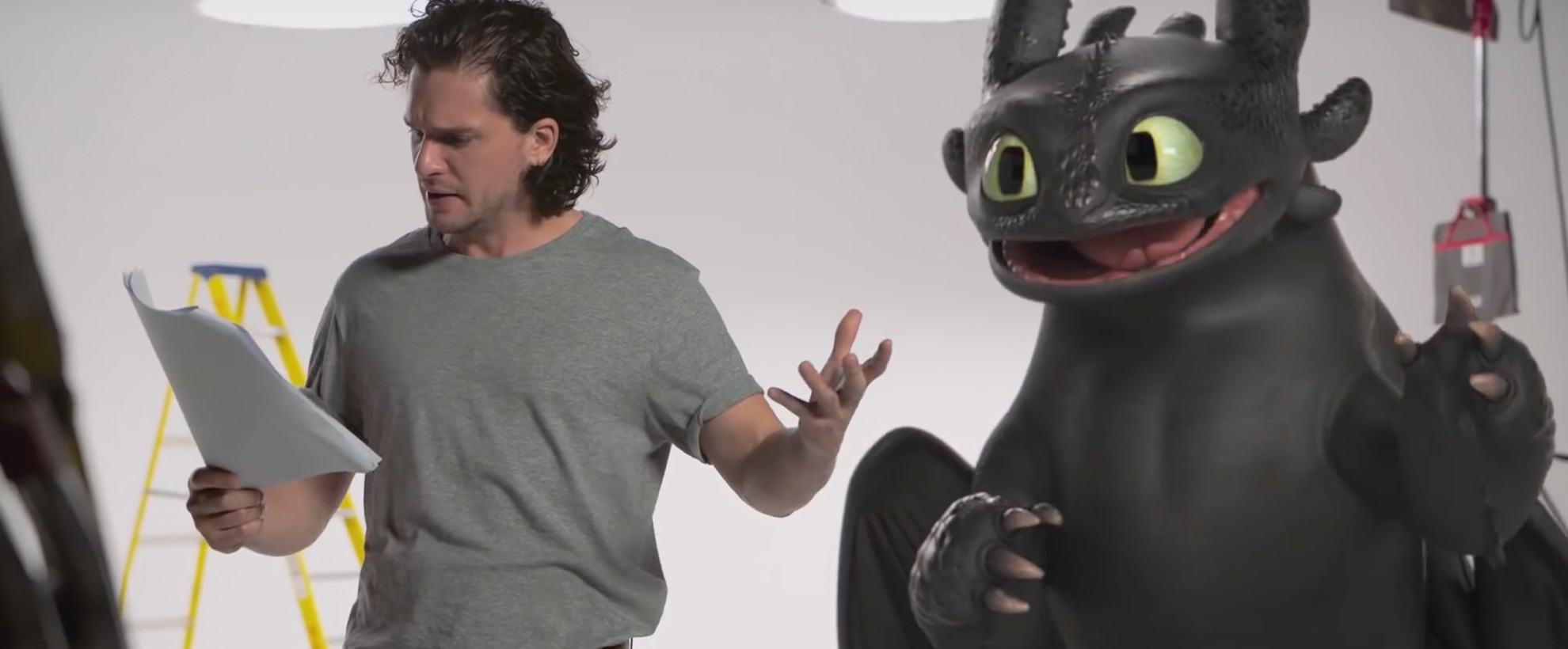 Kit Harrington and toothless from How to Train Your Dragon