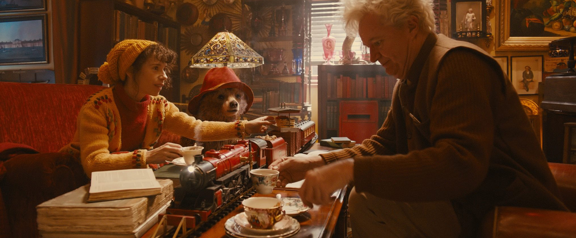 Paddington and Mrs Brown visit local shopowner, Jim Broadbent