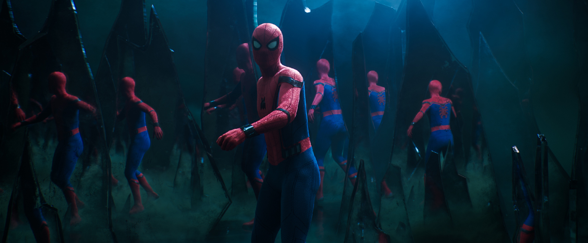 The illusion battle scene in Spider-Man Far From Home, Spider-Man is surrounded by versions of himself