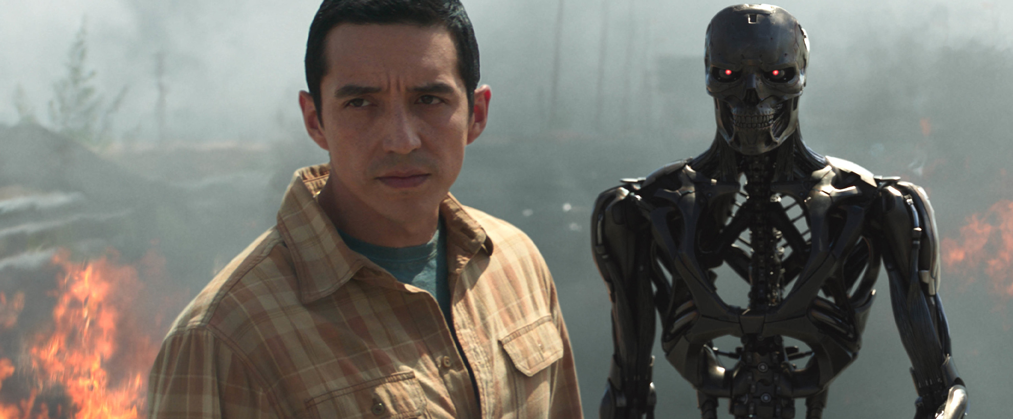 A man and a black skeleton robot
