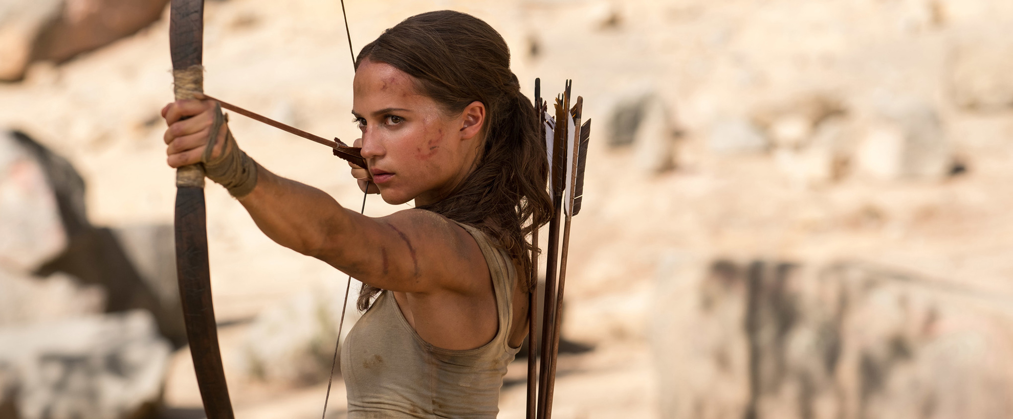 Lara Croft (Alicia Vikander) uses a bow and arrow
