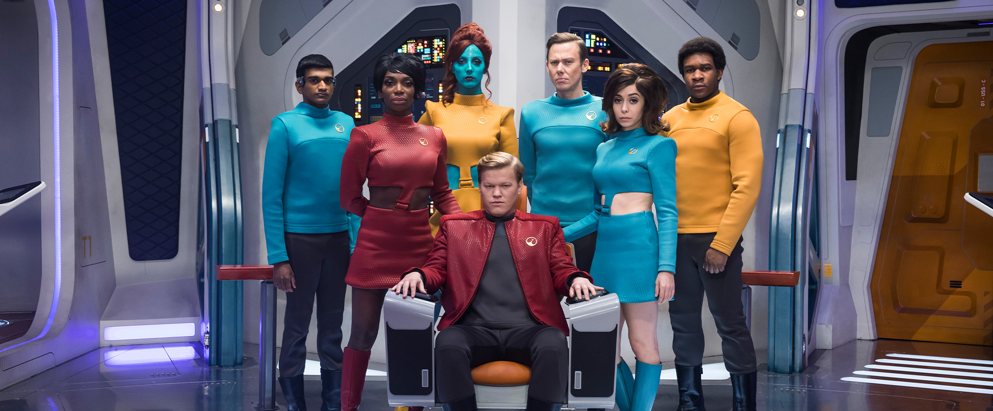 The cast of USS Callister in a star trek-like spaceship set