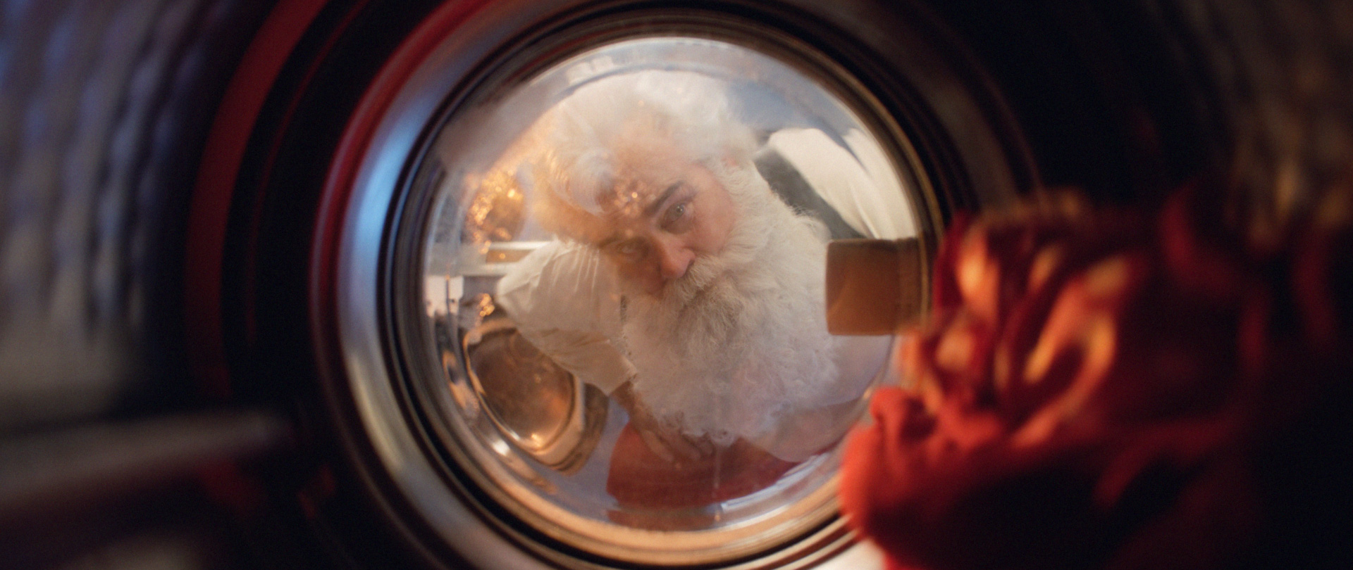 Santa looking in washing machine