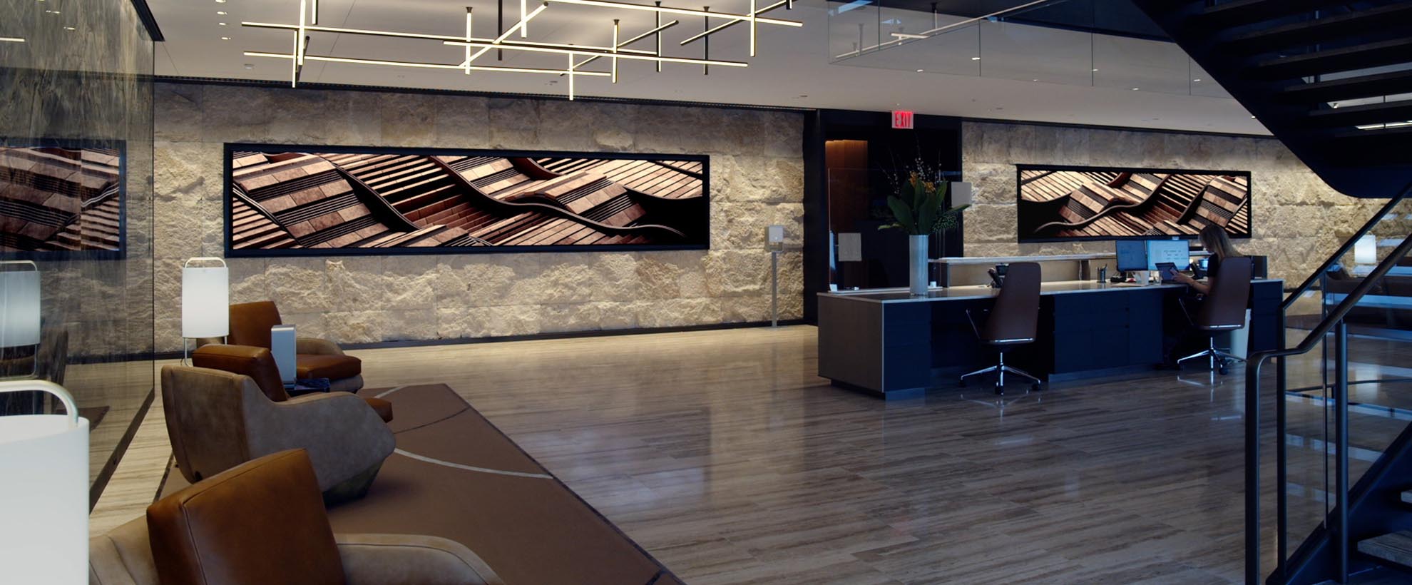 A modern lobby with large screens