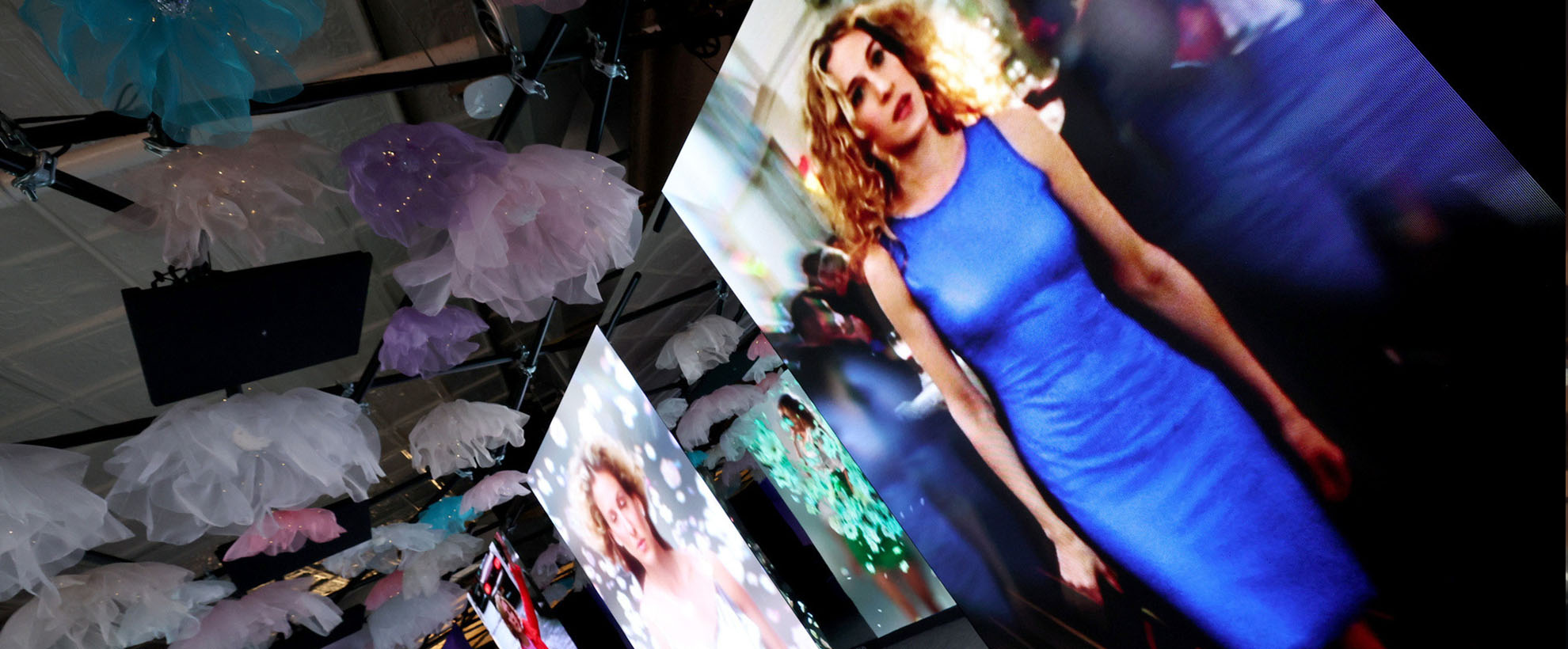 Carrie Bradshaw from 'Sex and the City' displayed on several different screens