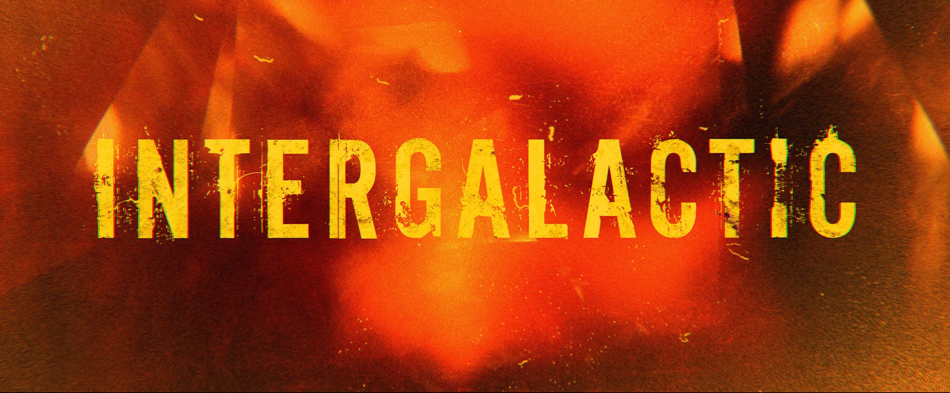 "Intergalactic" in a bold yellow font, on an orange and red background