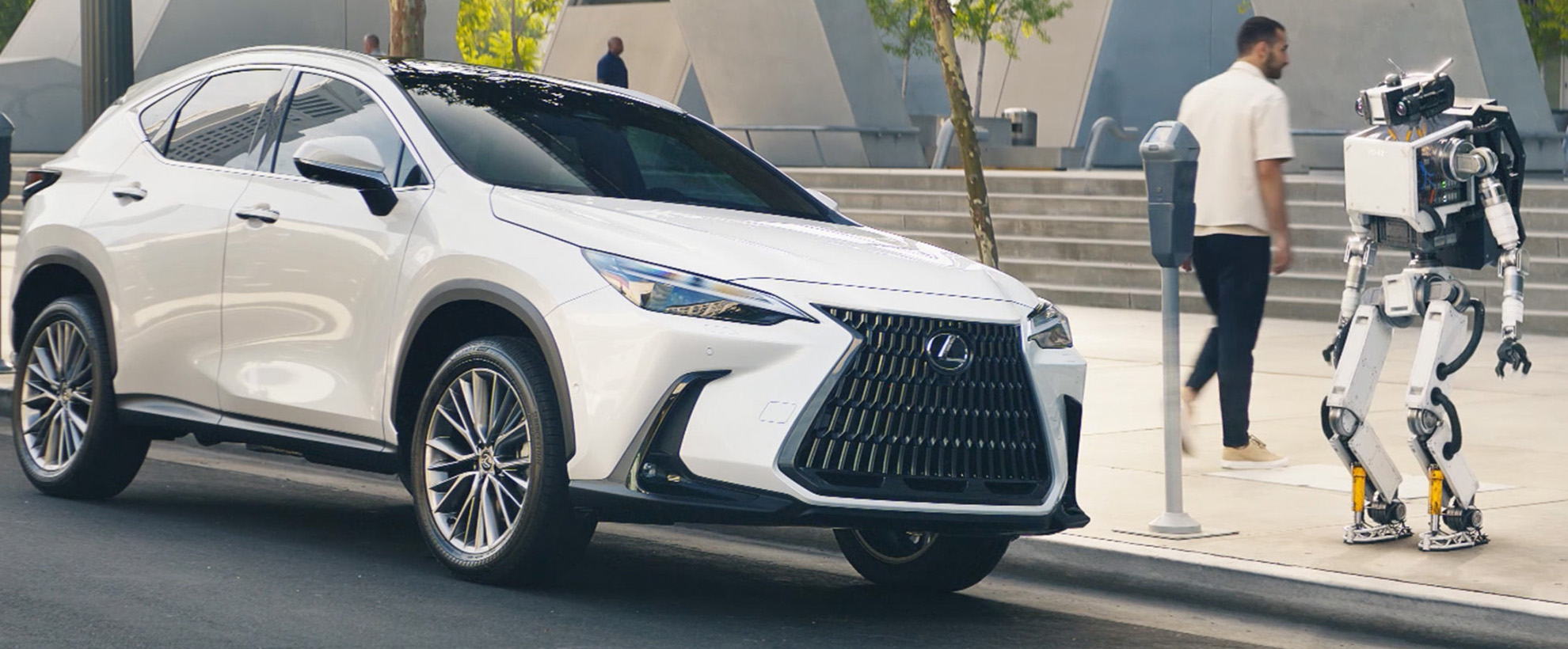 A man walks out of his white Lexus SUV that is parked at a parking meter. A white robot stands next to the car. 