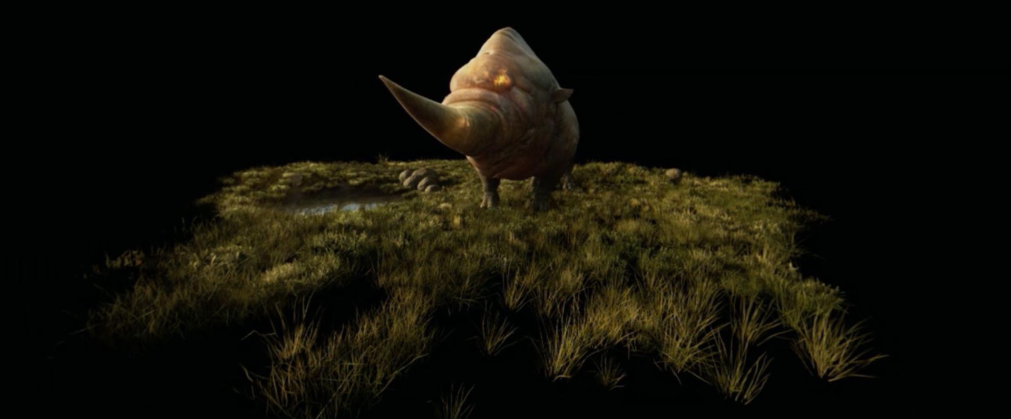 A fictional animal that look rhino-like stands in a grassy plain