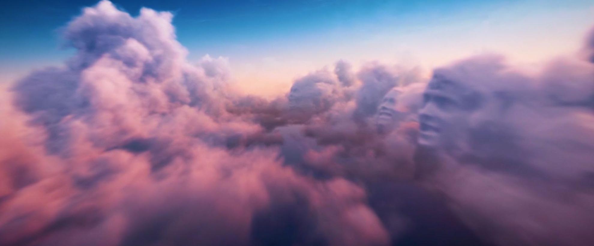 Pink and blue clouds. The clouds look like people's faces.