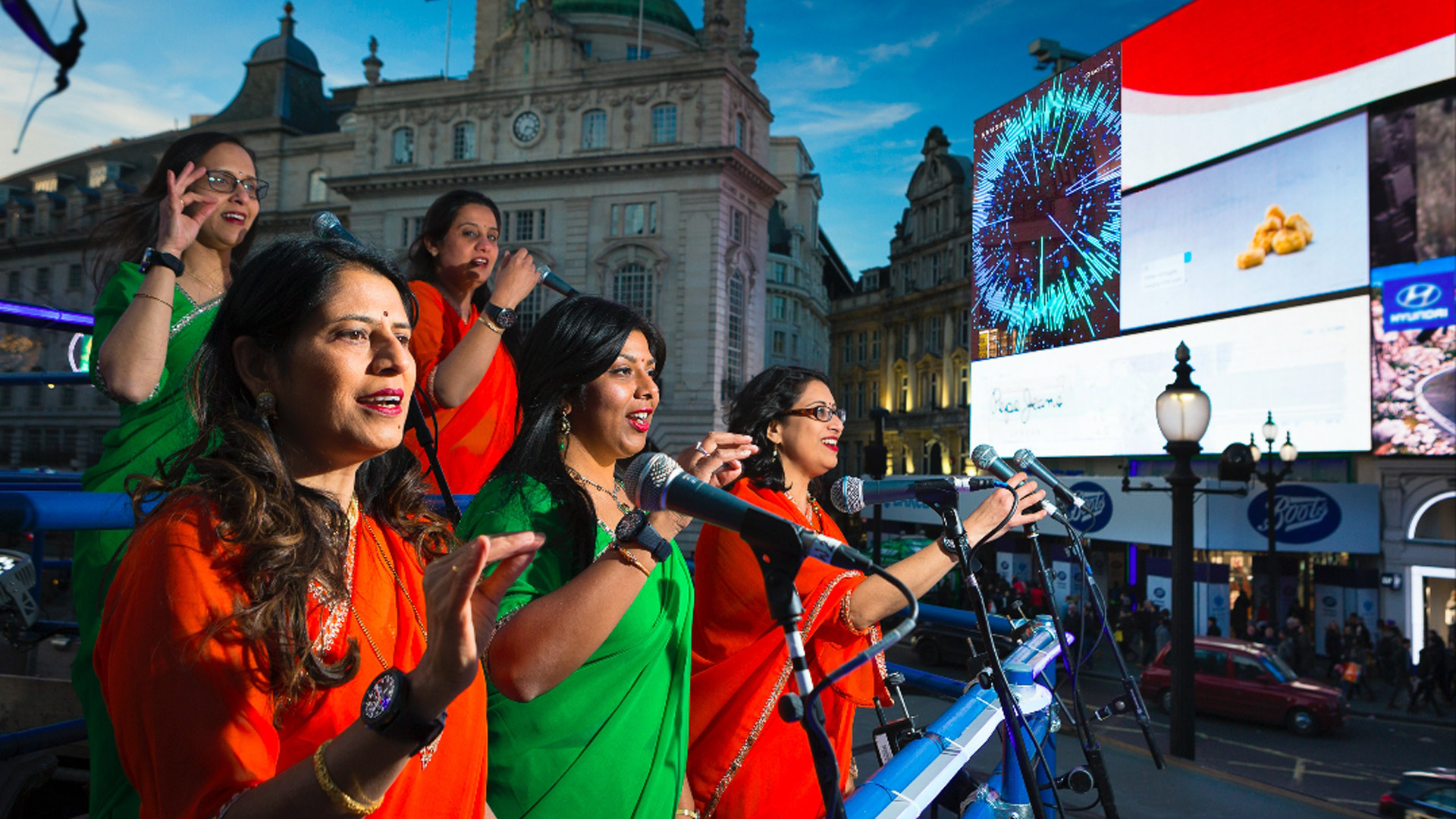 a choir singing on a stage in london