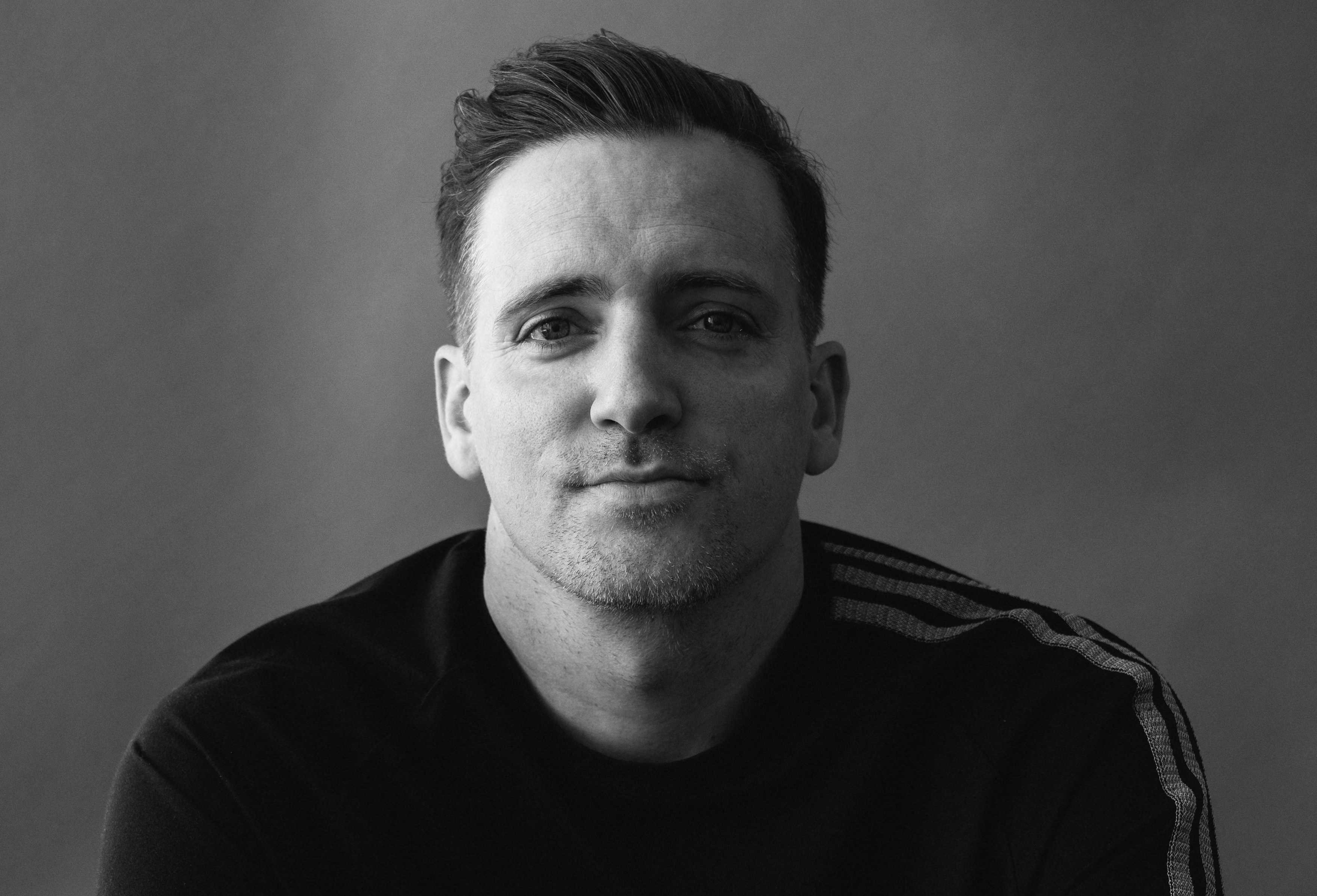 A black and white photo of Executive Creative Director John Likens