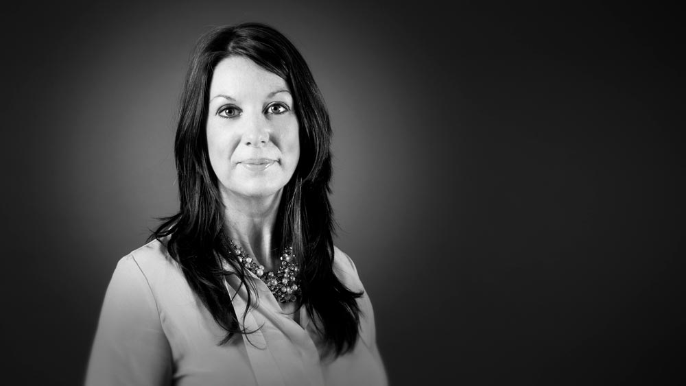 A black and white photo of Helen Hughes