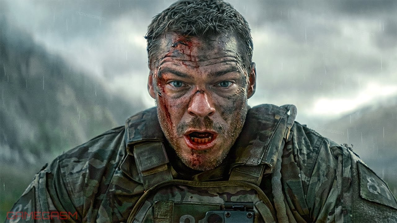 Alan Ritchson face zoomed in shot of him at the battlefield 