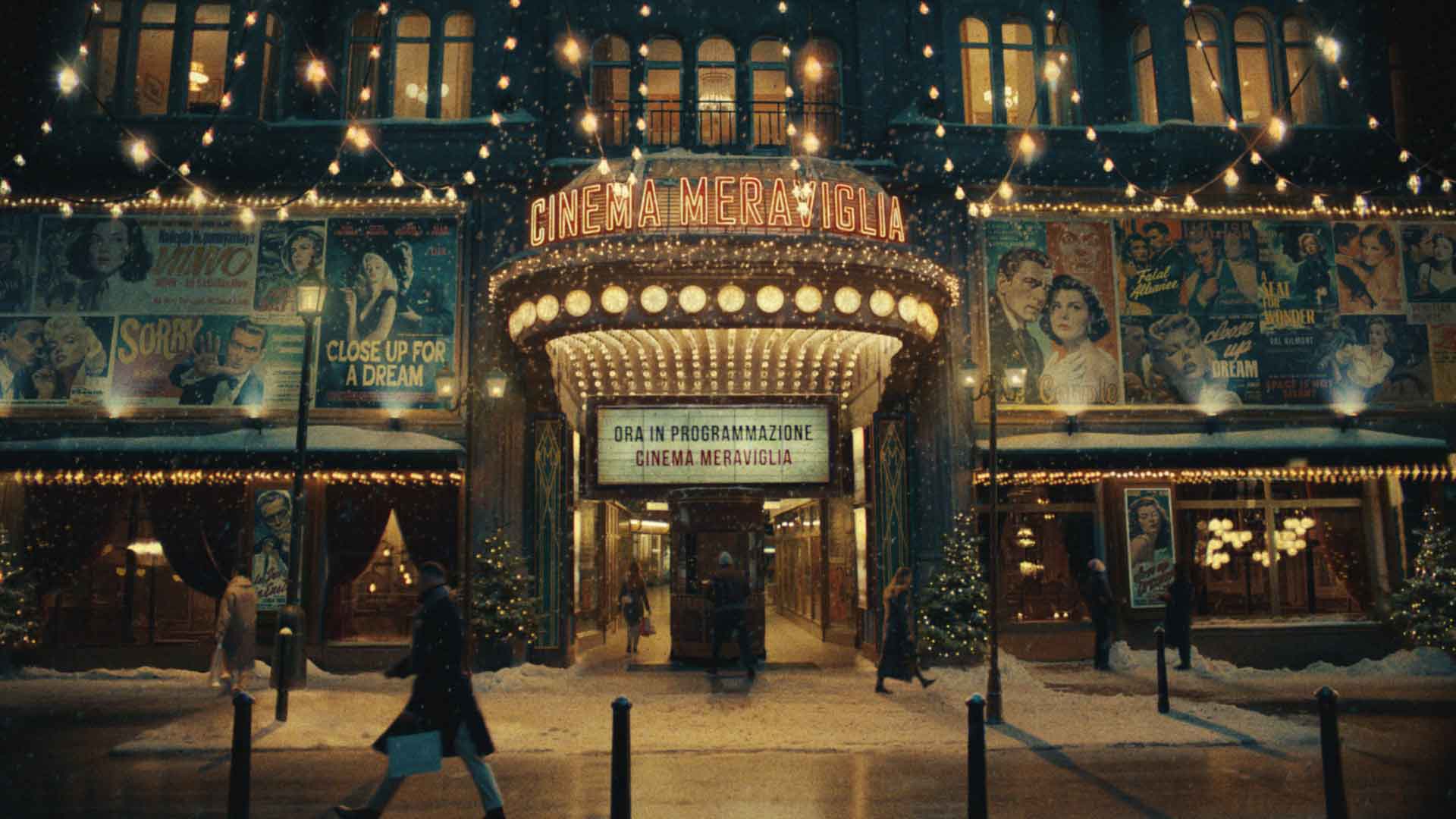 Brunello Cucinelli’s Holiday Campaign - an old fashioned theatre front in a snowy city