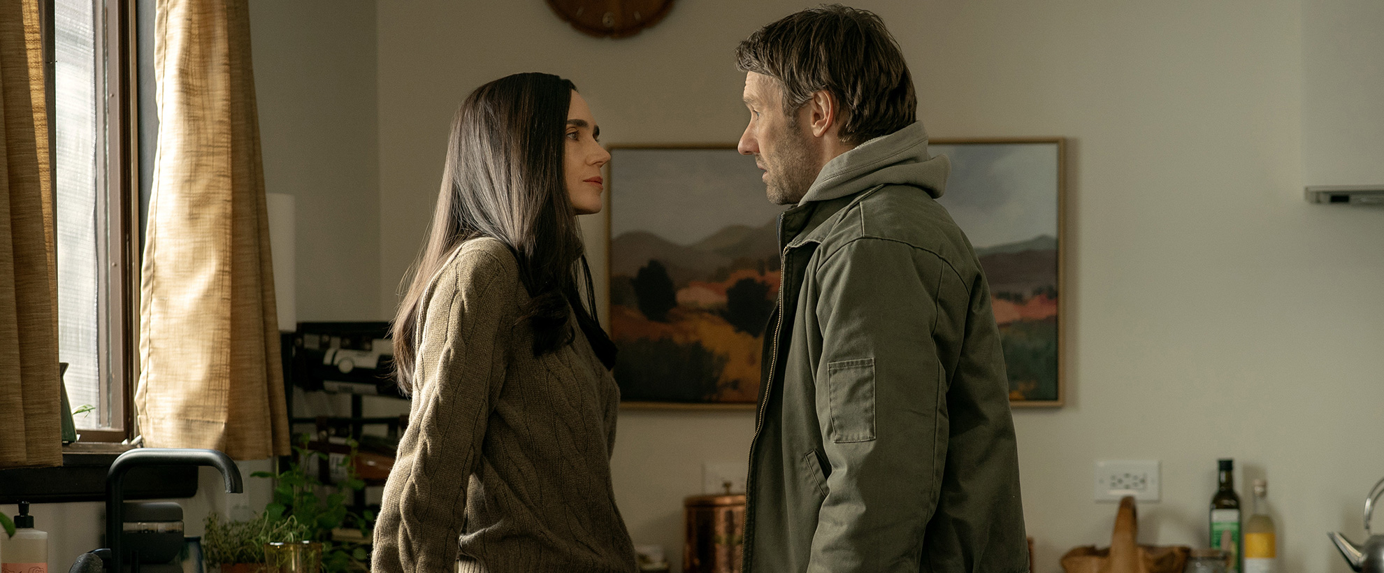 A still from Dark Matter Season 2, showing Daniela (Jennifer Connelly) standing opposite Jason Dessen (Joel Edgerton)