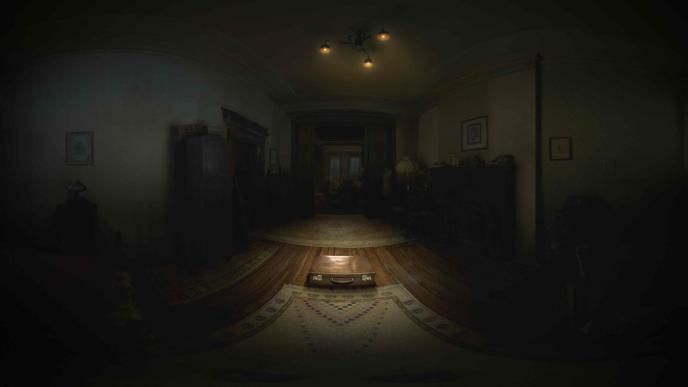 dimly lit living room with a suitcase in the centre that has been highlighted by the spotlights