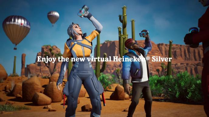 two animated characters in the desert in front of cacti and heineken branded hot air balloons. they are holding up heineken beer cans as if they are about to drink them