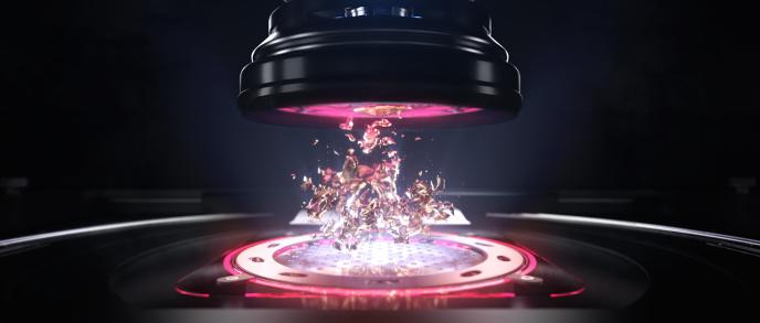 an animation of a large magnet device with gold particles in the centre