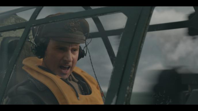 close up of cg animated steve carell as mark hogancamp shouting inside of a plane cockpit 