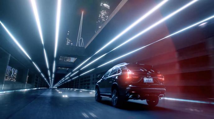 behind shot of a 4x4 byd car driving through a tunnel highlighted with strip led lights