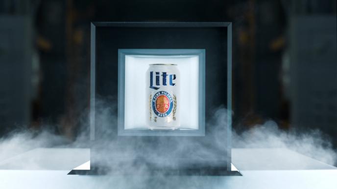 front view of a beer can inside of a frame. there is mist surrounding the frame