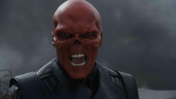 red skull character from captain america looking directly into the camera and shouting