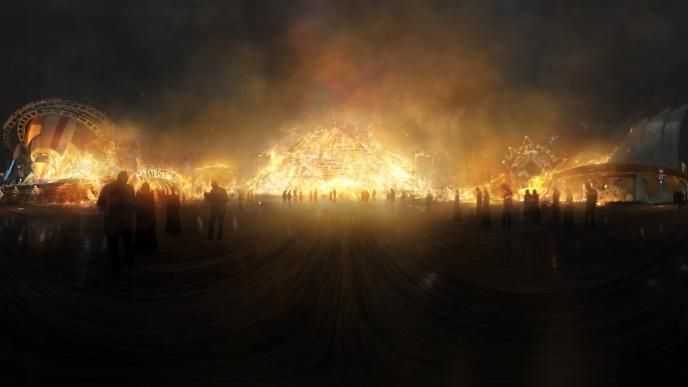front view of the dreamland boulevard entrance ablaze at night as silhouttes of people stand by
