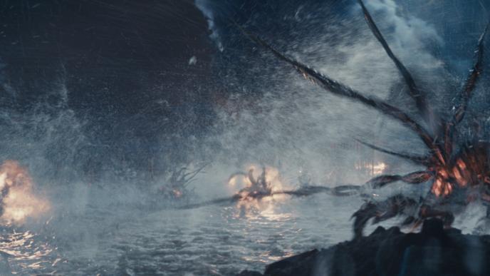 four mimic aliens ablaze on stormy waters