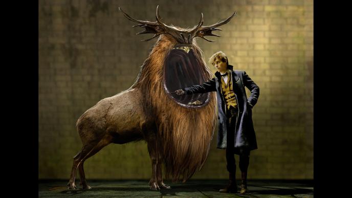concept art of newt scamander examining a leucrotta creature