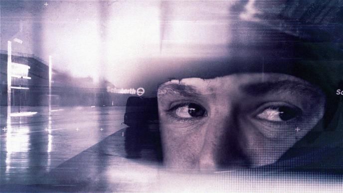 close up graphic of the eyes of a formula 1 race car driver in a helmet