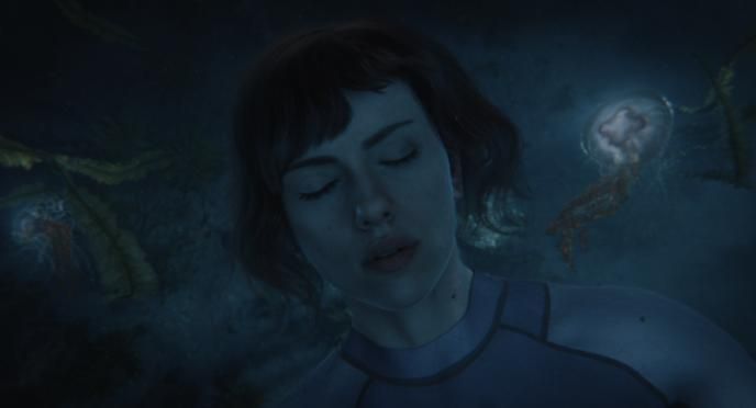 close up of actress scarlett johansson as major mira killian floating with her eyes closed