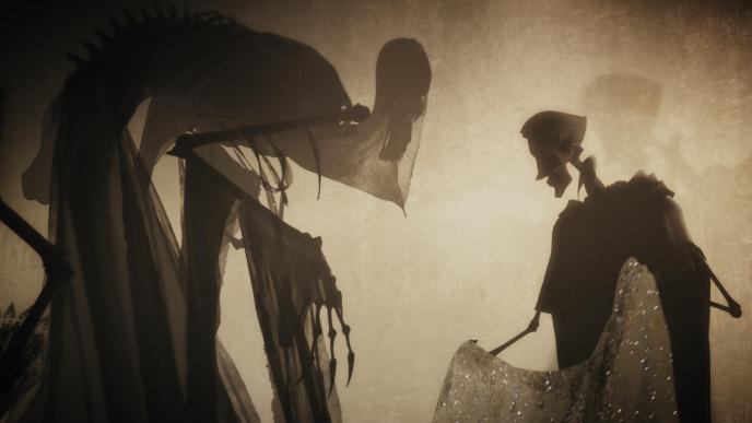 animation charicature of death and ignotus holding the cloak of invisibility