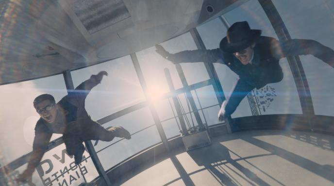 two people falling through a cable car
