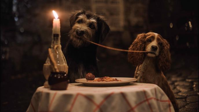 cg animated photorealistic lady and the tramp dogs sitting at a candlelit table eating spaghetti as they eat the same string of spaghetti