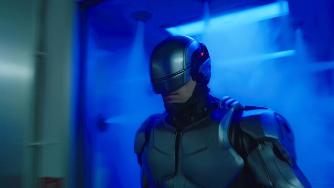 robocop in front of blue ceiling lights