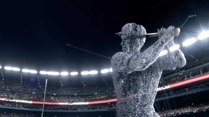 baseball player made up of dynamic graphic designs swinging a bat in a lit up stadium