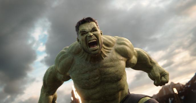 an angry hulk roaring with his hands down below a cloudy sky