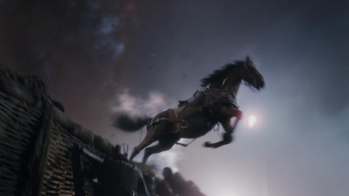 perspective from the trenches as joey the horse from war horse gallops mid air