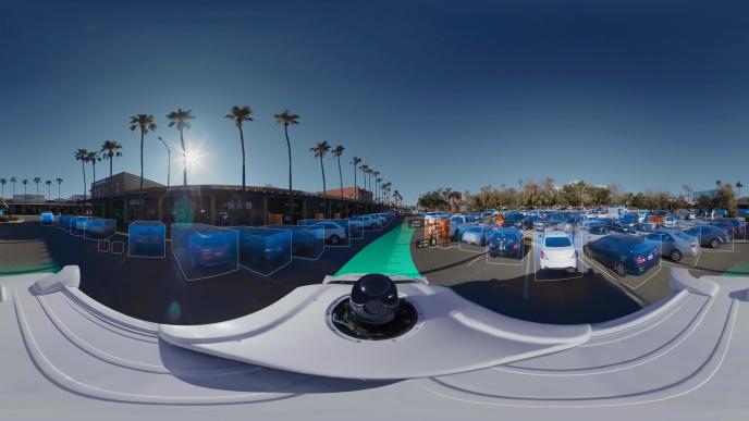 top view of a google car capturing cars in a car park