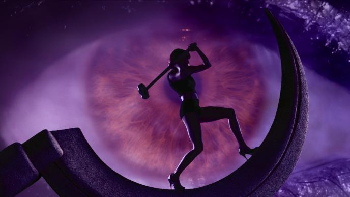 a silhoutte of a woman holding up a sledge hammer standing on a half moon crescent in front of a cg purple eye