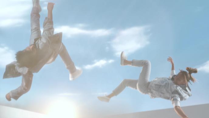 two people falling out of the sky