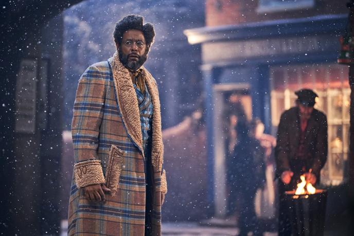 forest whitaker as jeronicus looking to the right in a snowy street