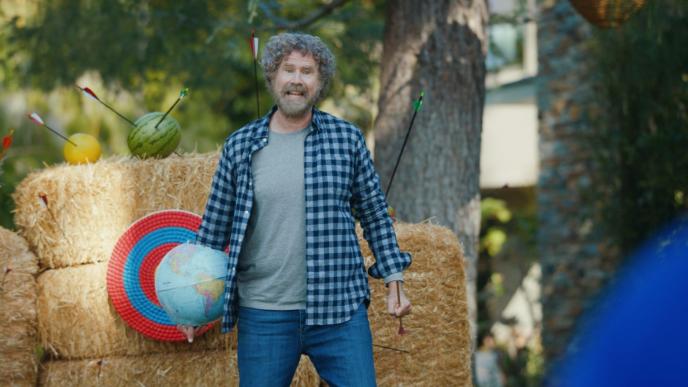 will ferrell shouting while holding a globe in his hand