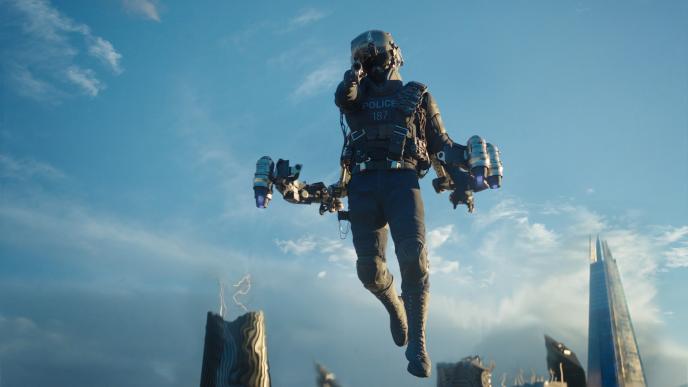 A futuristic police officer hovers in the air